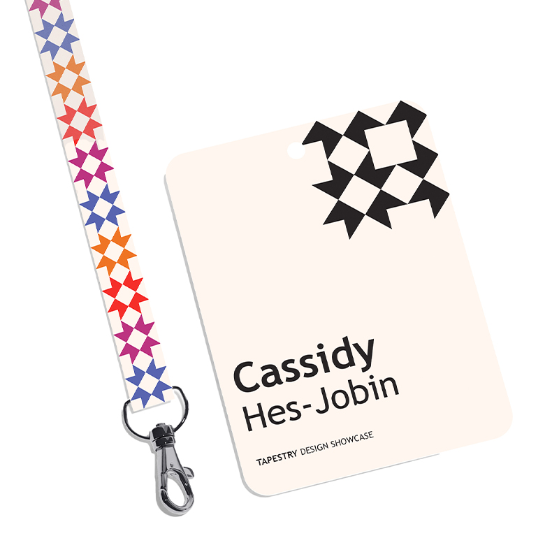 A lanyard that students would wear at the Tapestry event, featuring their name and logo in black on a white background